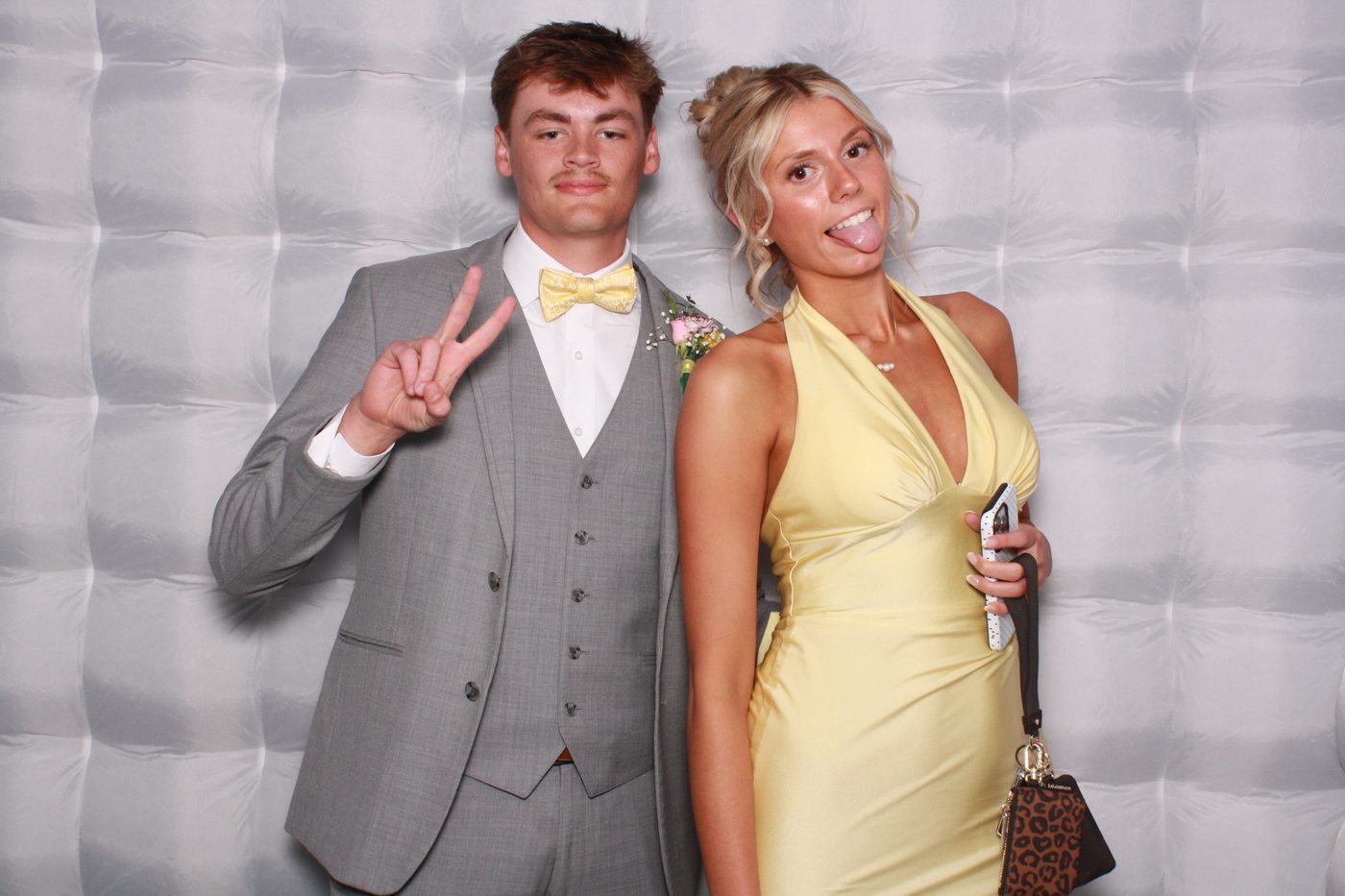 Prom couple in formal wear at a Jefferson City photo booth
